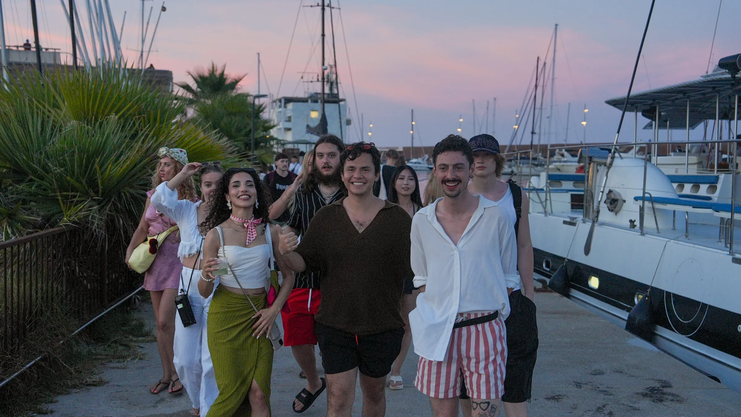 A group of Blau students at the old port of Barcelona at dusk