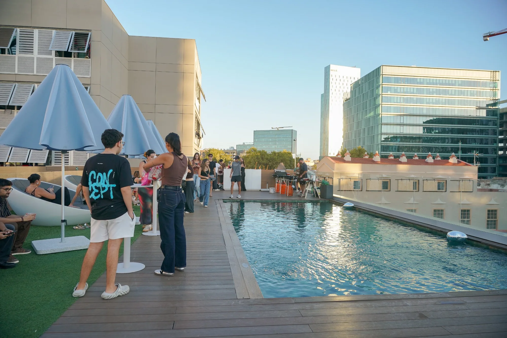 The rooftop pool at an evening event